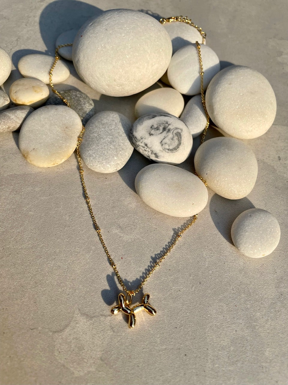 Balloon dog necklace